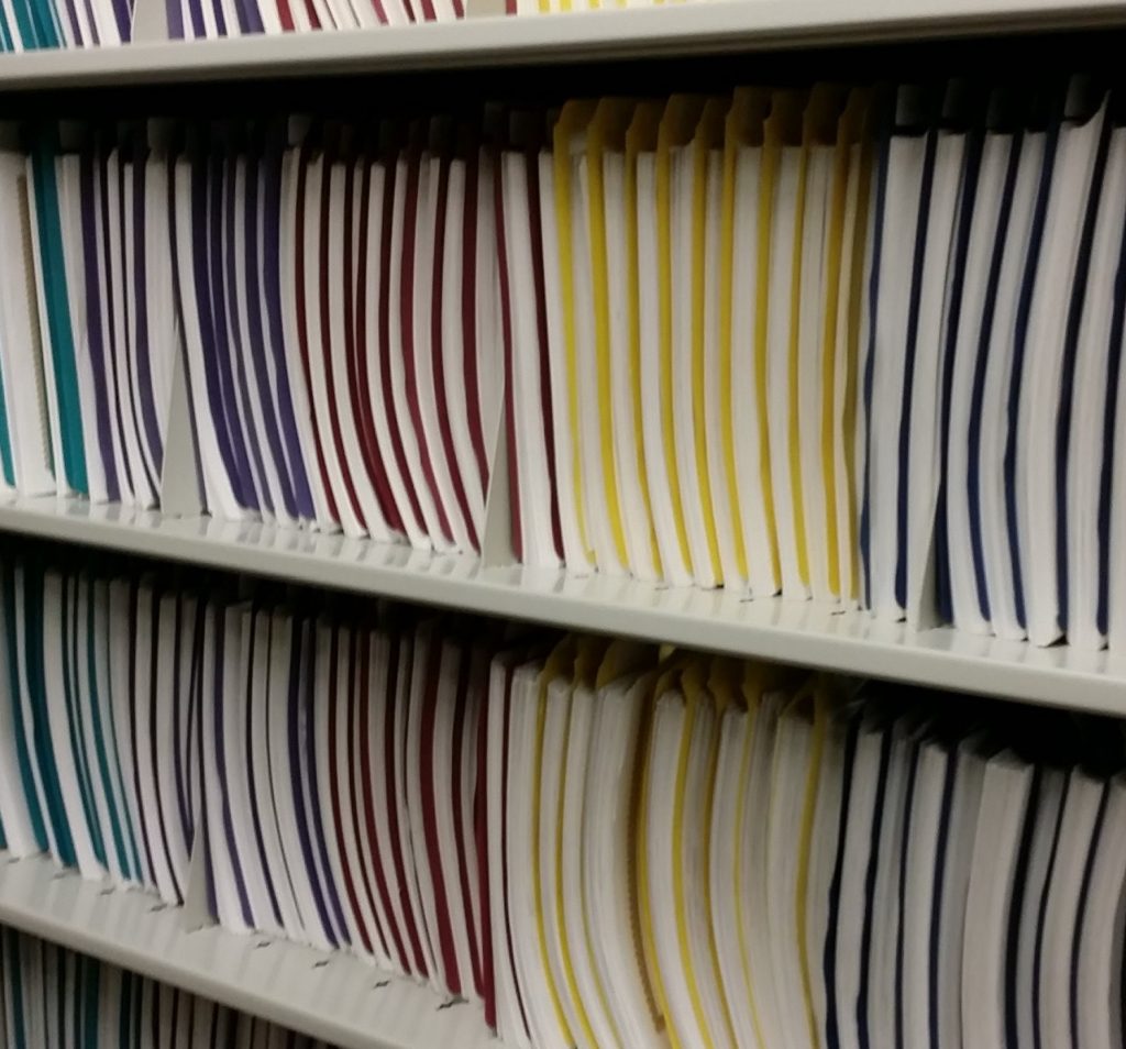 Modern marriage licenses on open shelving